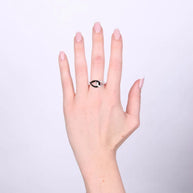 Anello in Argento 925 gocce intrecciate con smalto nero e zirconi