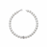 Bracciale con perle coltivate d'acqua dolce, chiusura e sfera puntinata in oro 18kt