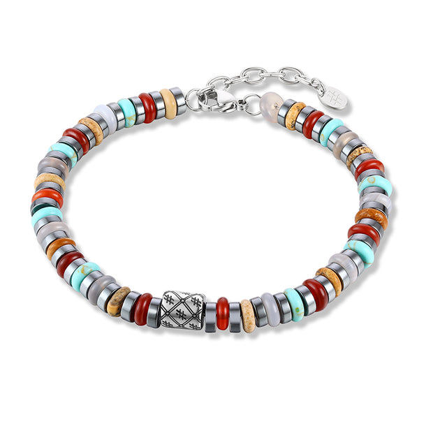 Bracciale con pietre turchesi, rosse e beige ed ematite scura