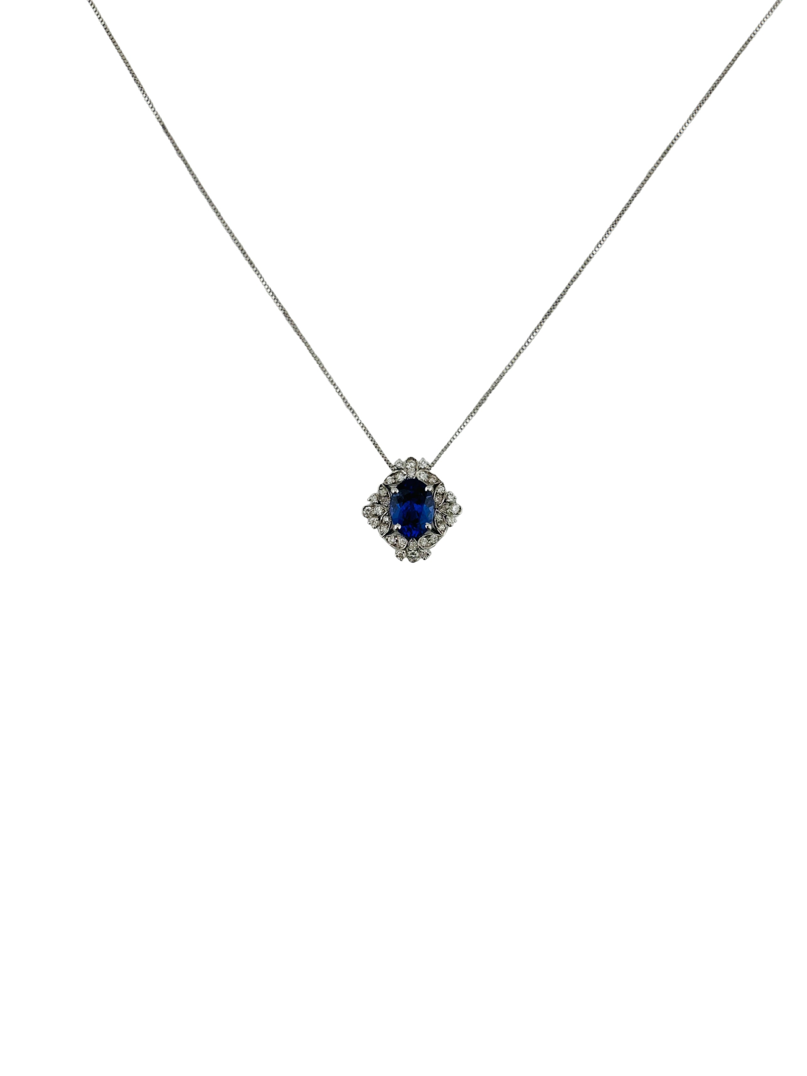 Collana in oro bianco 750% con diamanti e tanzanite