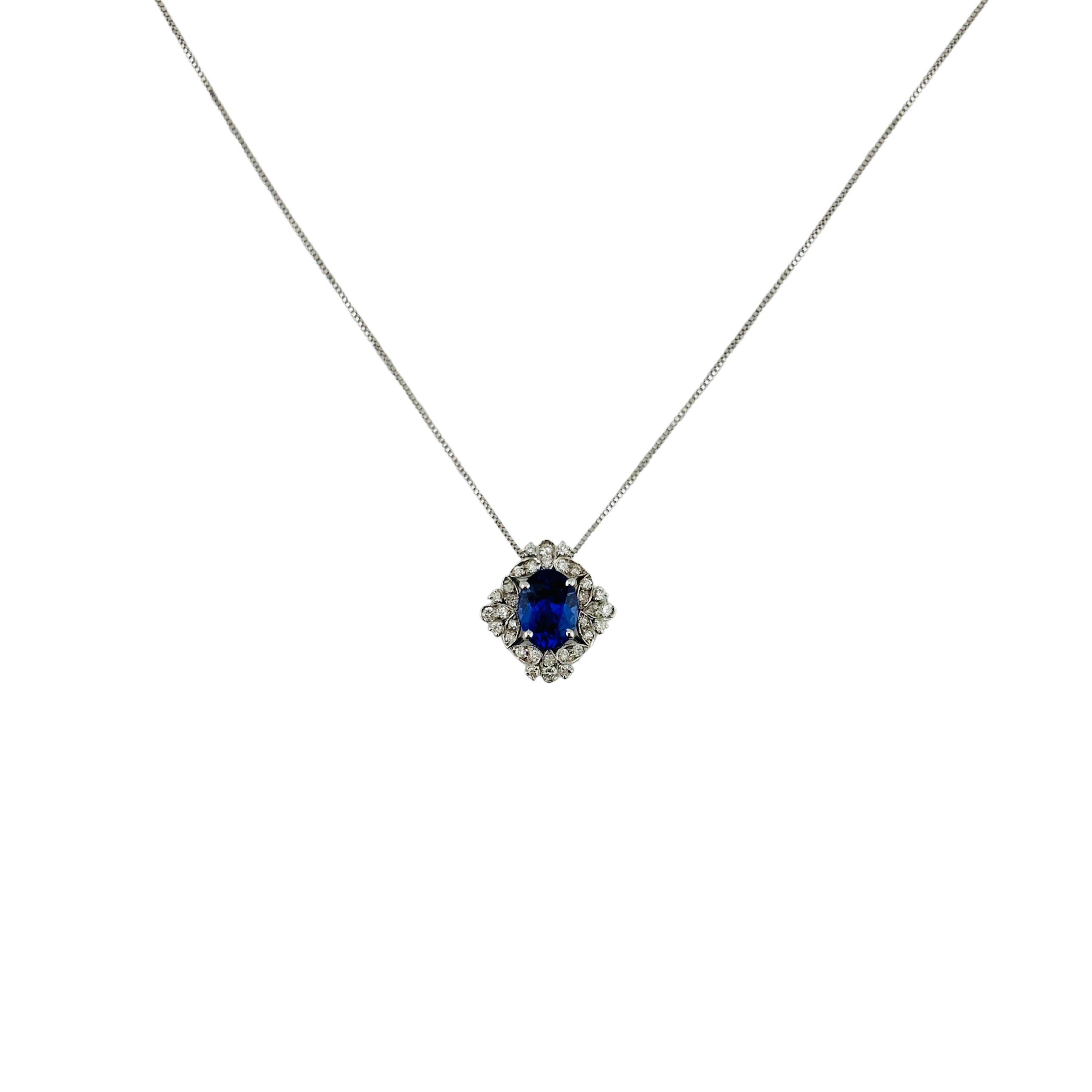 Collana in oro bianco 750% con diamanti e tanzanite