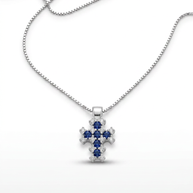 Collana in oro bianco 18 kt con croce di zaffiri e diamanti