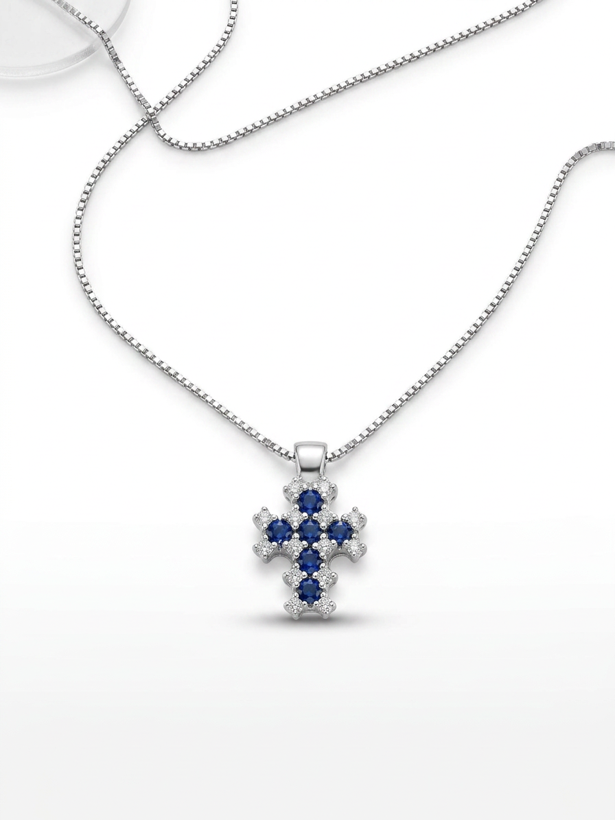 Collana in oro bianco 18 kt con croce di zaffiri e diamanti