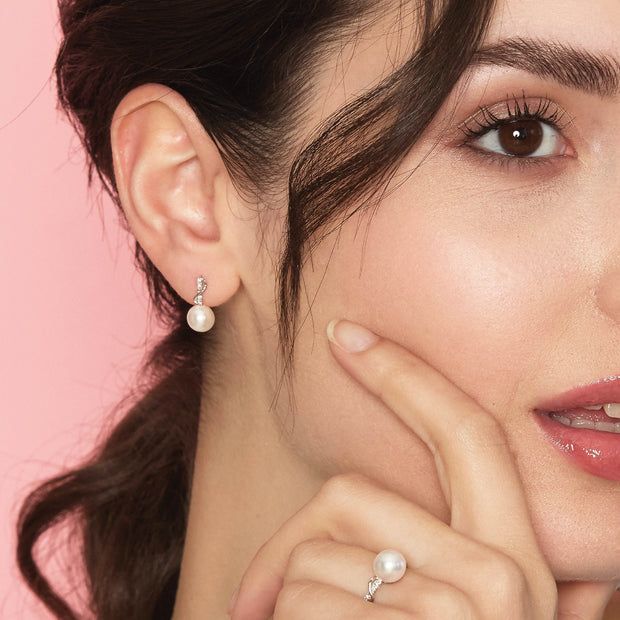 Orecchini con perle naturali, oro 18 kt e diamanti