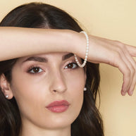 Bracciale con perle coltivate d'acqua dolce forma a RISO e chiusura in oro 18kt