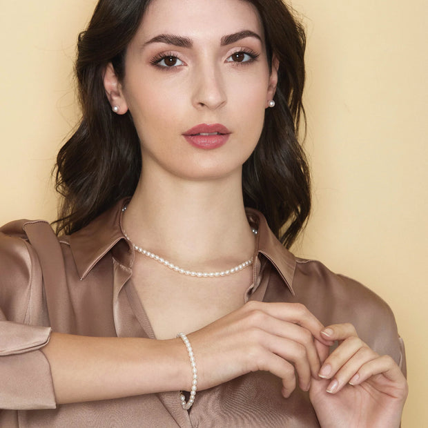 Bracciale con perle coltivate d'acqua dolce forma a RISO e chiusura in oro 18kt